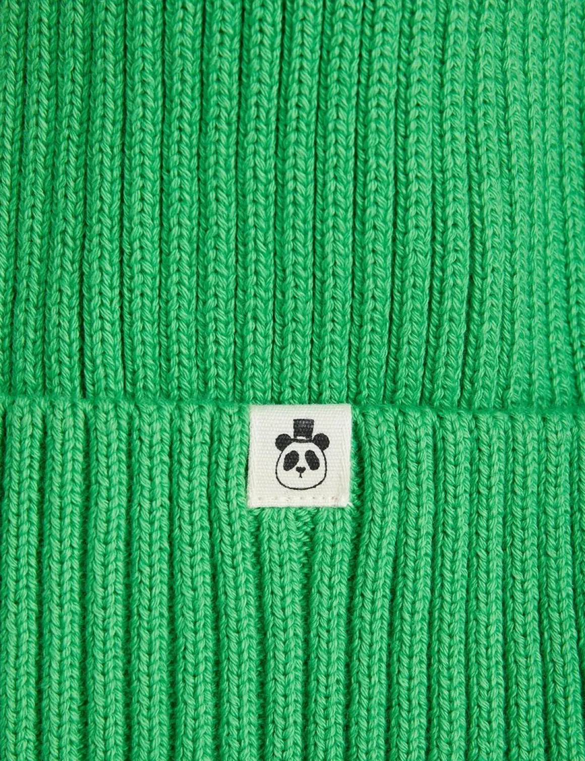 Stickad Beanie med Tofs